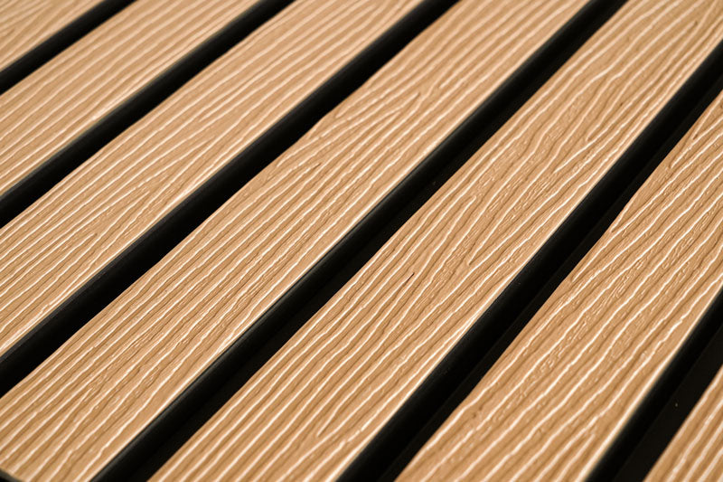 Maple Exterior Slat Wall Paneling With Black Accents and Embossed Wood-Effect Composite Siding