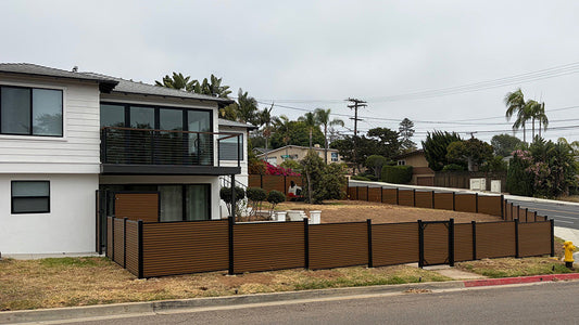 Carlsbad, CA WPC Fence Project: Weathered Teak with Black Accents Installation by Lightning Technologies Group