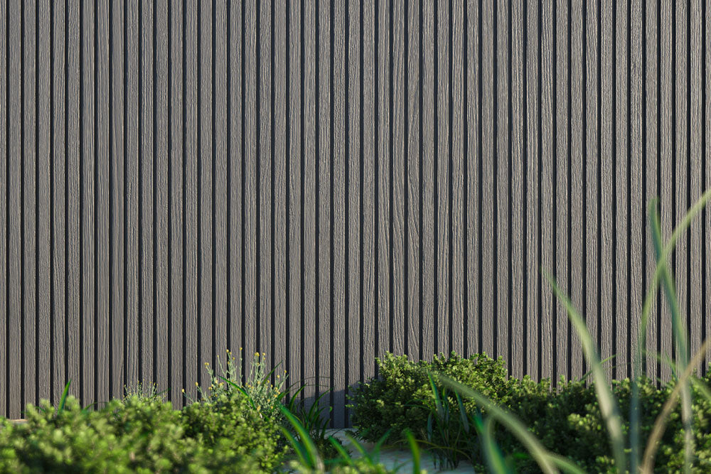 Stone Gray Exterior Slat Wall Paneling With Black Accents and Embossed Wood-Effect Composite Siding